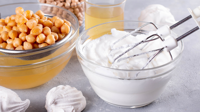 A bowl of whipped aquafaba and chickpeas