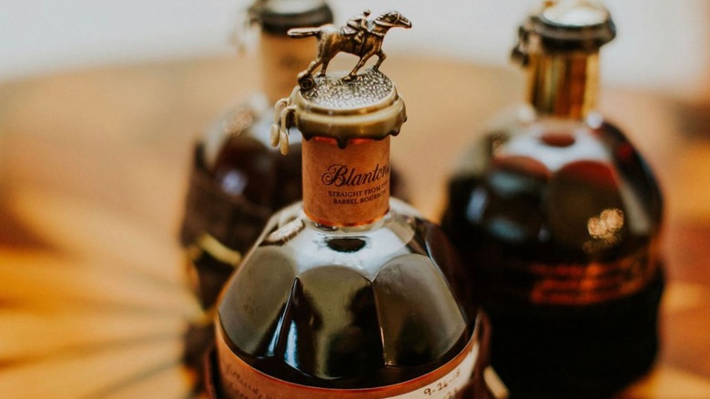 Blanton's bourbon bottles bokeh