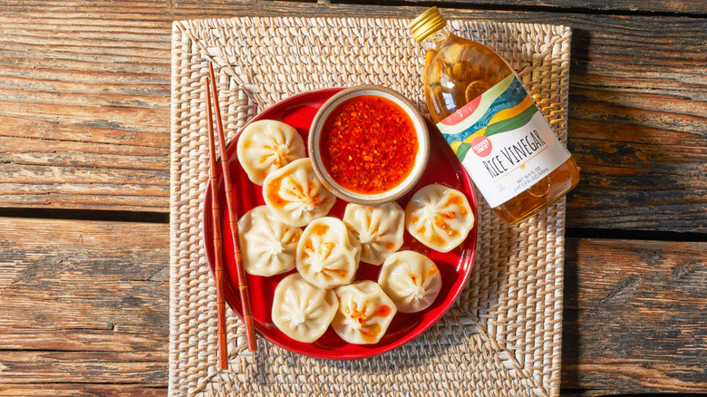 Trader Joe's soup dumplings with dipping sauce and rice vinegar