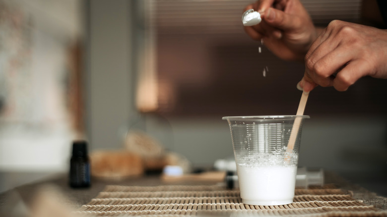 Home cook making baking soda cleansing paste