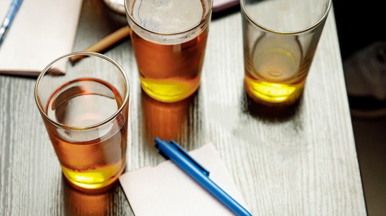 beer displayed next to paper