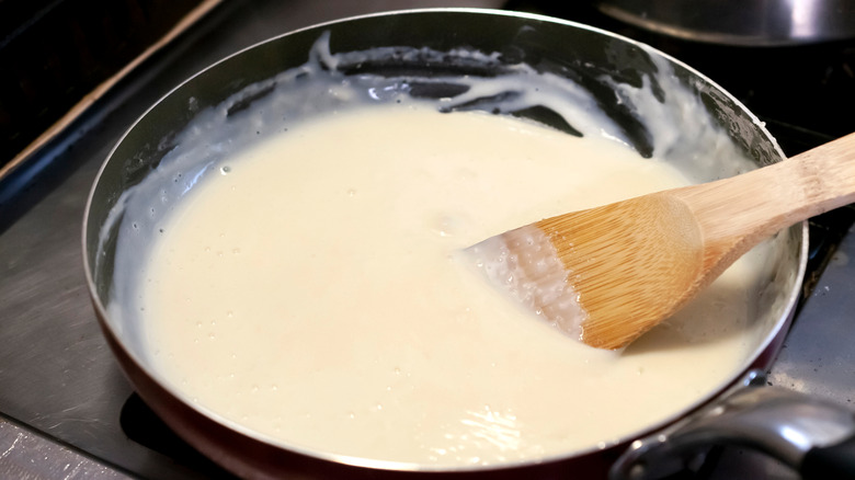 Béchamel sauce on stove