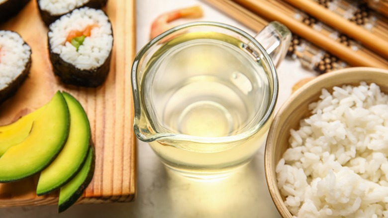 rice vinegar with rice and sushi