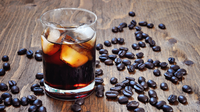 Kahlua liqueur with coffee beans