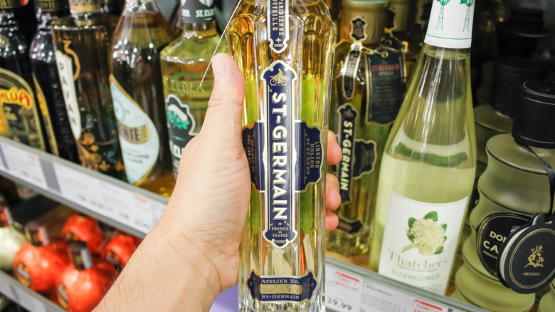 St. Germain elderflower liqueur in hand