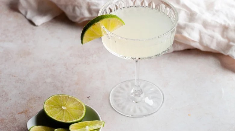 Gimlet with lime wedge garnish