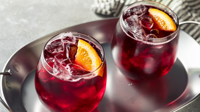 Red wine spritzers with orange slices