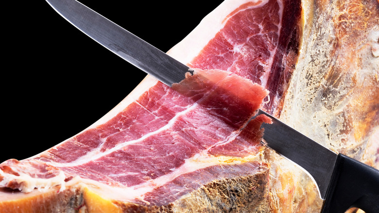 boning knife carving slice of jamon 