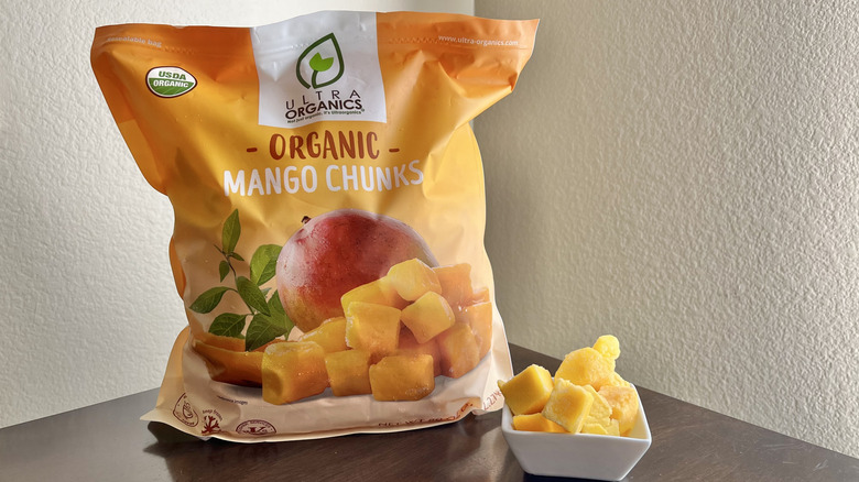 Bag of organic mango chunks on a table