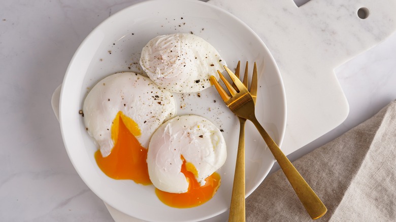 Poached eggs on plate