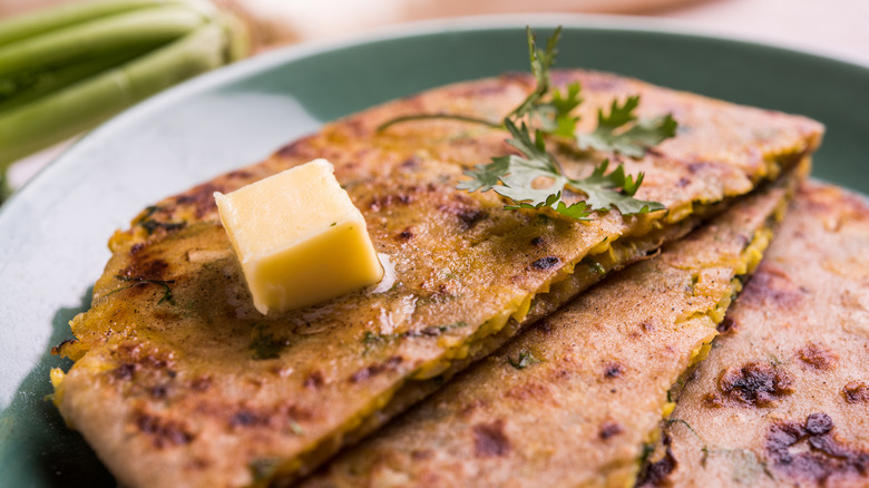 Paratha topped with slab of butter