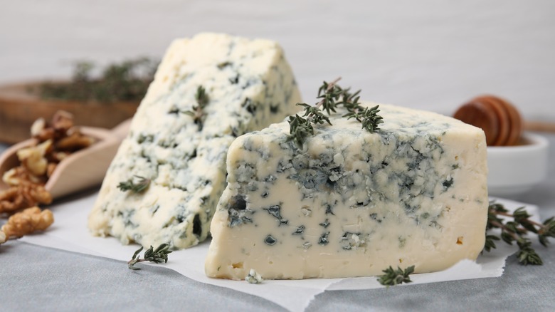 blue cheese wedges on tablecloth