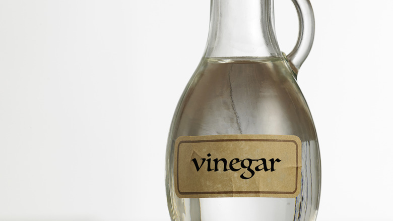 white vinegar in glass jar