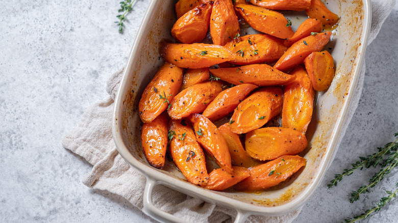 dish of oven roasted carrots with a glaze