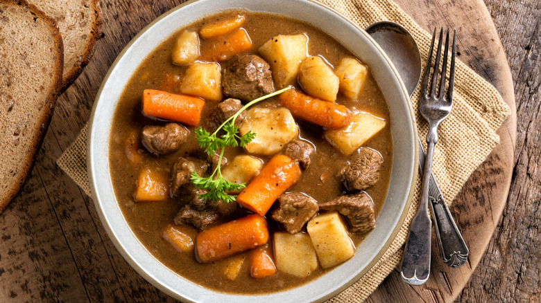 Bowl of meat stew with turnips and carrots