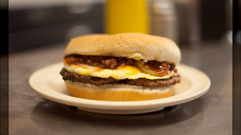 Chili cheeseburger on plate