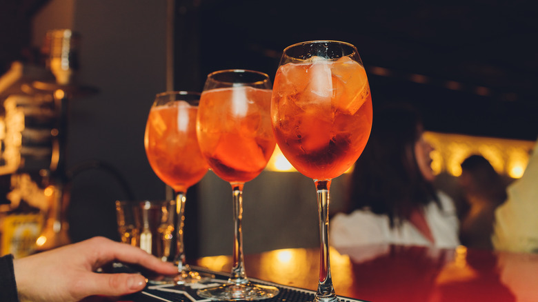 Negroni Spagliatos in wine glasses