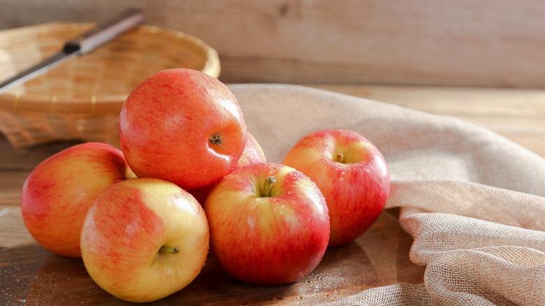 Jazz apples on a wooden board