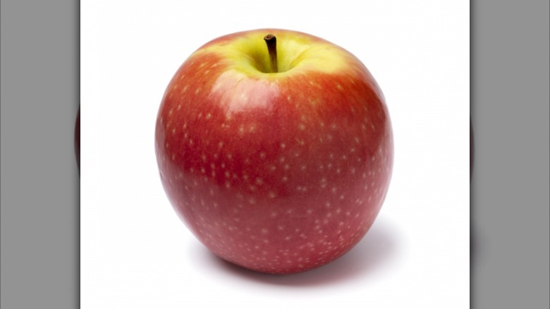 Pink Lady apple on white background