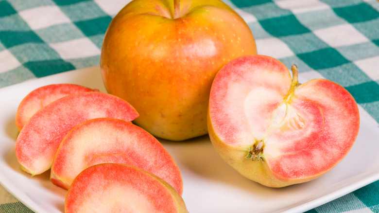 Pink Pearl apple on table