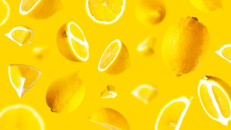 Lemons on yellow background