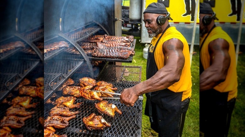 Dem 2 Brothers employee grilling meat