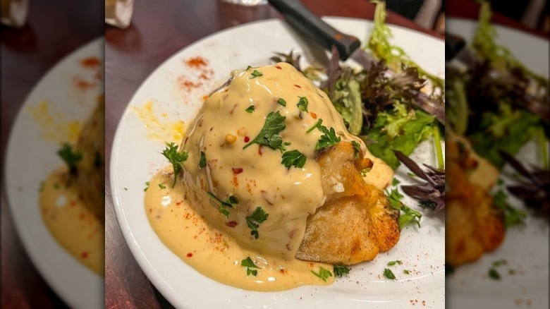 Crawfish beignet in sauce