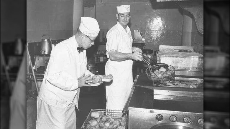 Vintage image of frying beignets