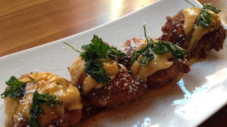 Duck and sweet potato beignets