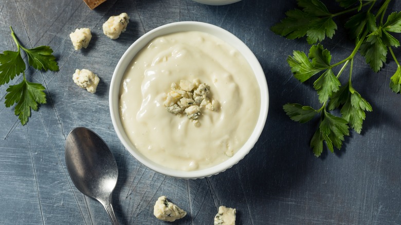 Homemade blue cheese dressing in a white dish