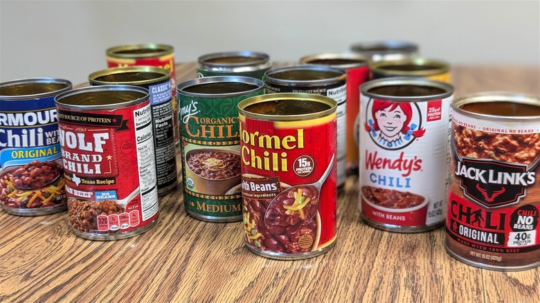 empty chili cans on table