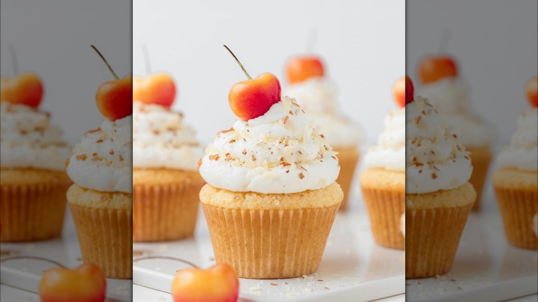 Rainier cherries on cupcake