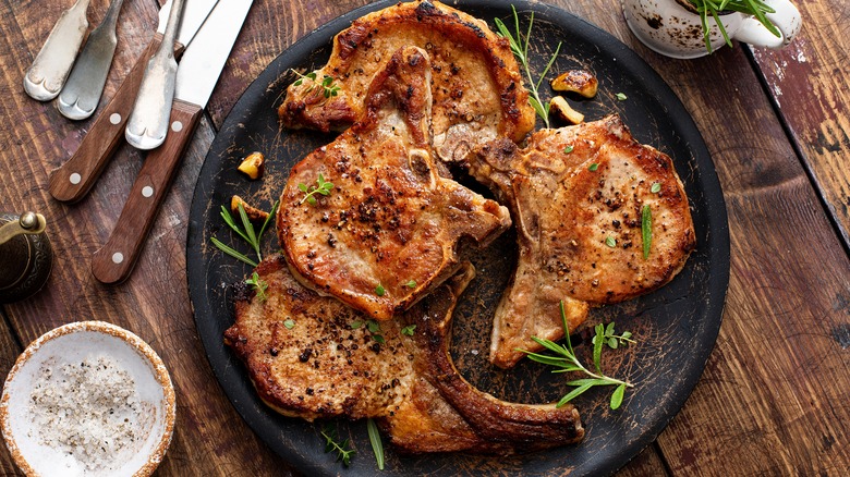 bone-in pork chops on plate