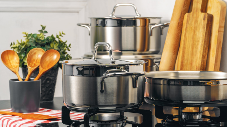stainless steel pots and pans on the stove