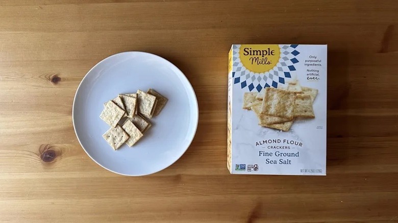 aerial shot of Simple Mills crackers on wooden table