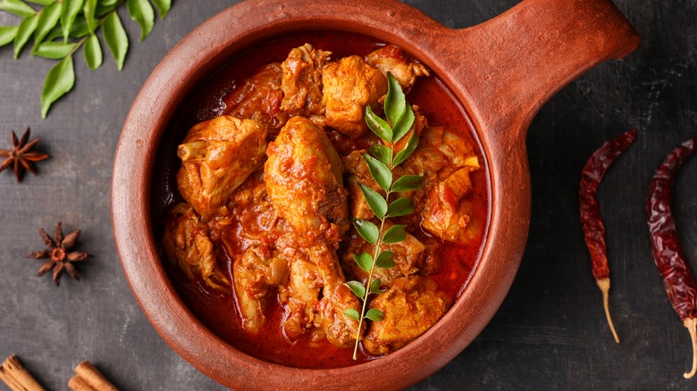 bowl of curry with chicken thighs