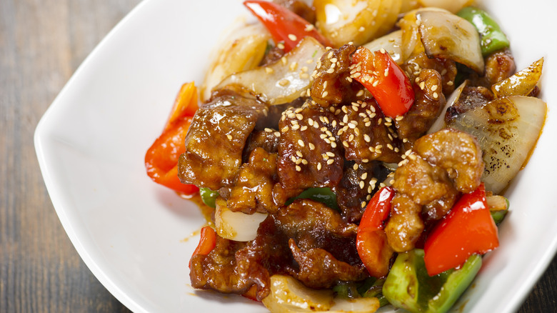 Sweet and sour pork with peppers and onions