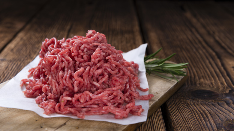 freshly ground meat on a cutting board