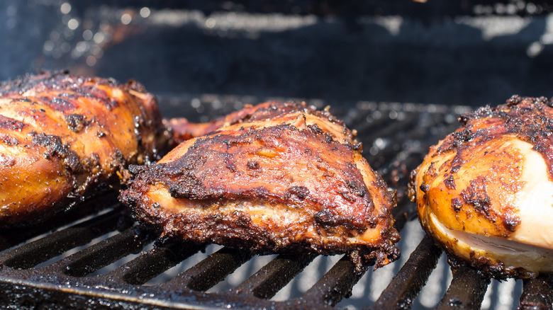 Chicken thighs on a grill