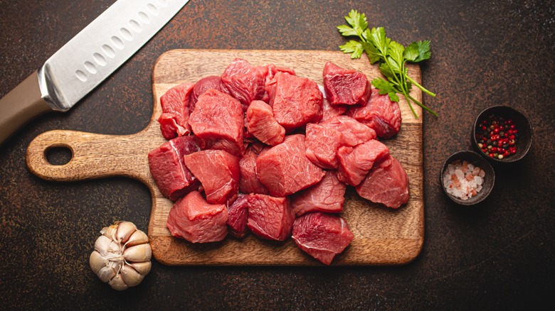 beef tenderloin on wood board