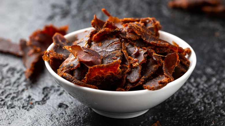 Pork jerky in white bowl