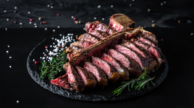 a cooked and sliced t-bone