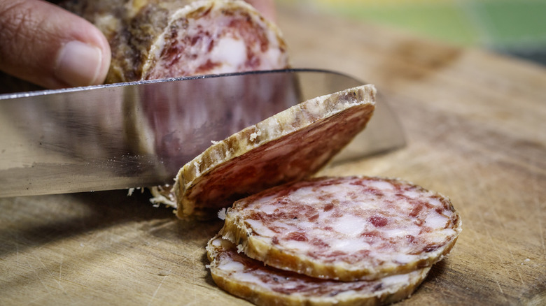 salami being sliced