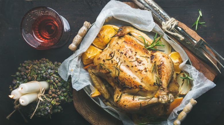 roasted chicken with glass of rosé