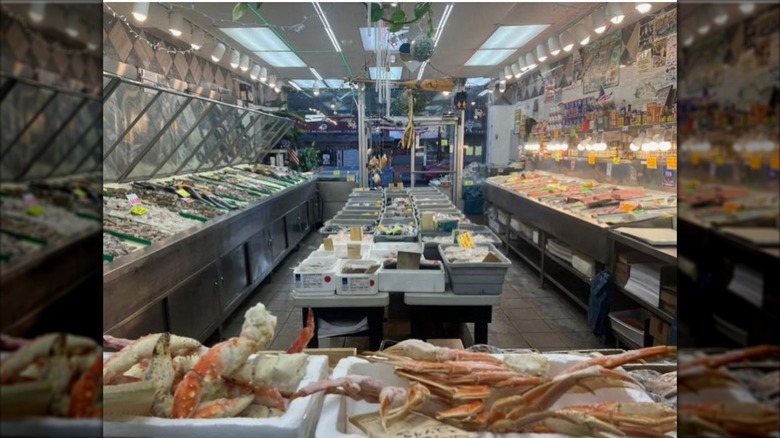 Interior of Randazzo's Seafood with crab legs in forefront