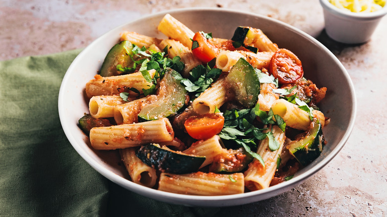 Rigatoni with zucchini, tomatoes, basil