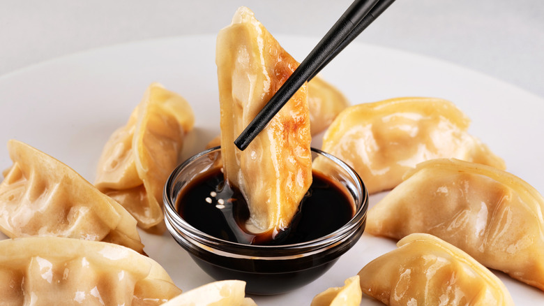 Gyoza being dipped