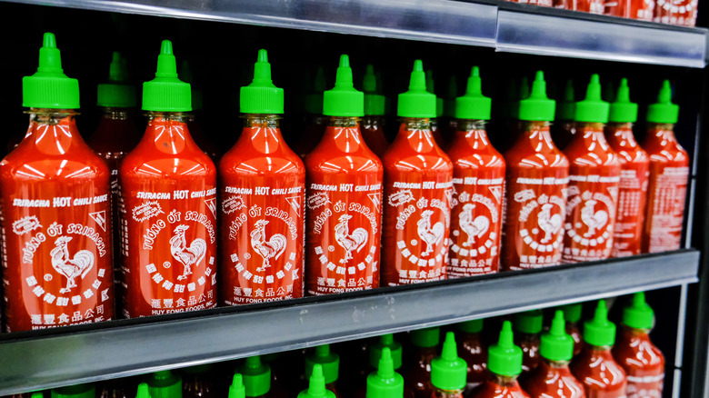 Sriracha bottles on shelf