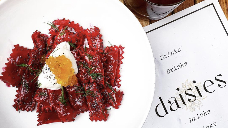 Daisies beet agnolotti with dill and smoked trout roe