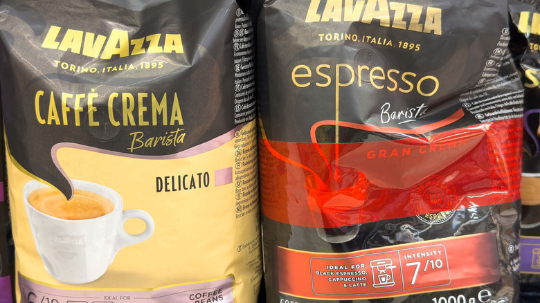 Bags of Lavazza whole bean coffee in store